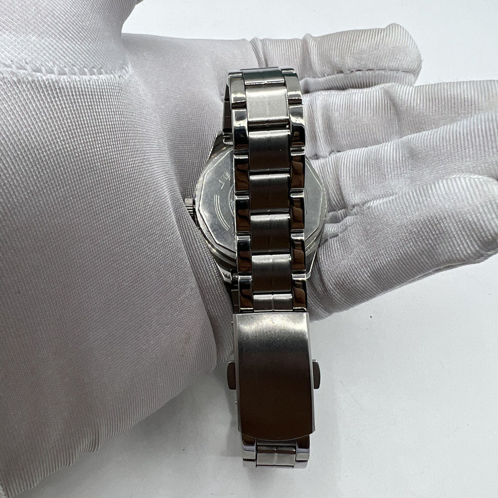 32mm Chinese Taihang manual watch with black dial, golden markers, and 17-jewel precision movement for stylish timekeeping.