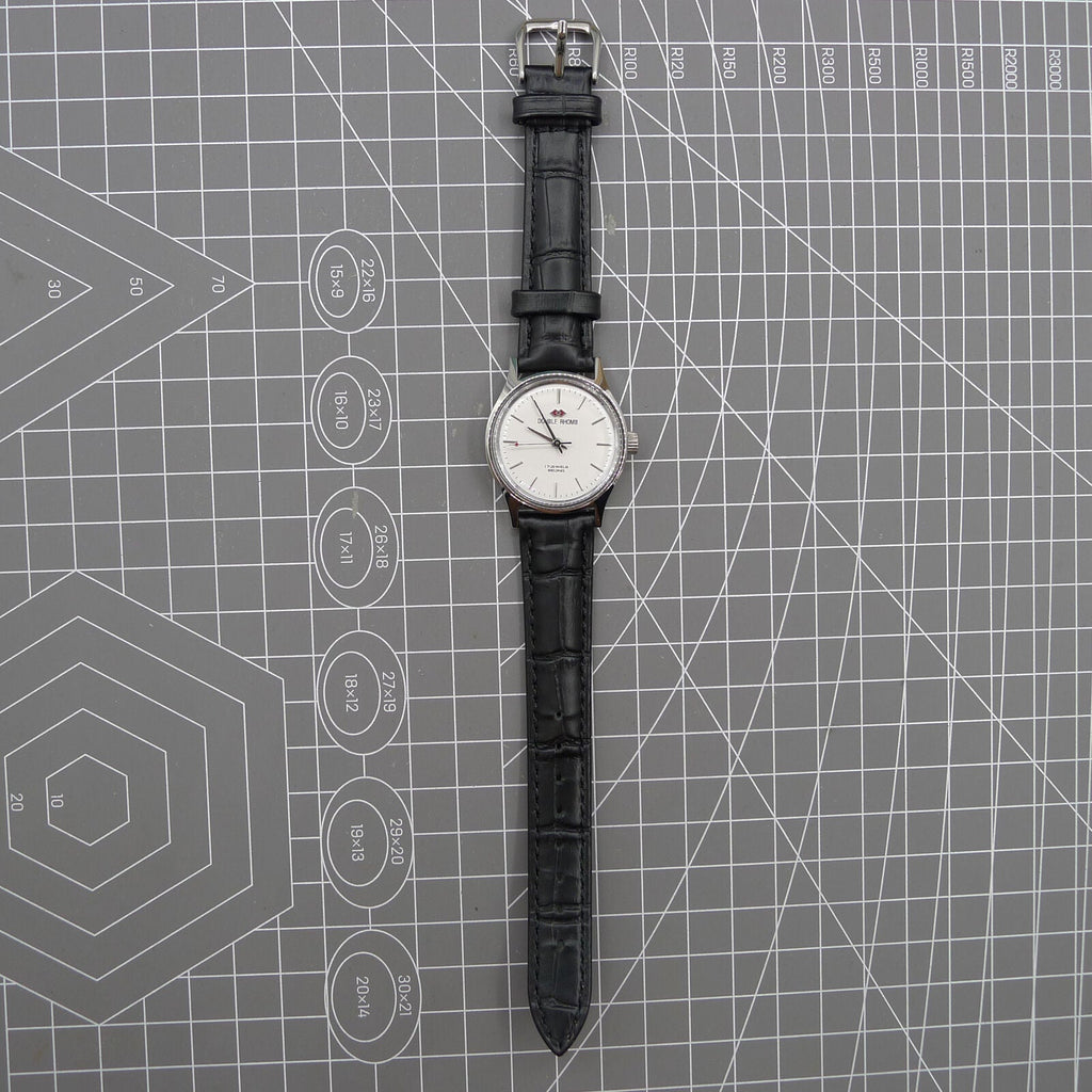 Silver 31mm Beijing Double Rhomb manual mechanical watch with three hands, elegant design by Beijing brand.