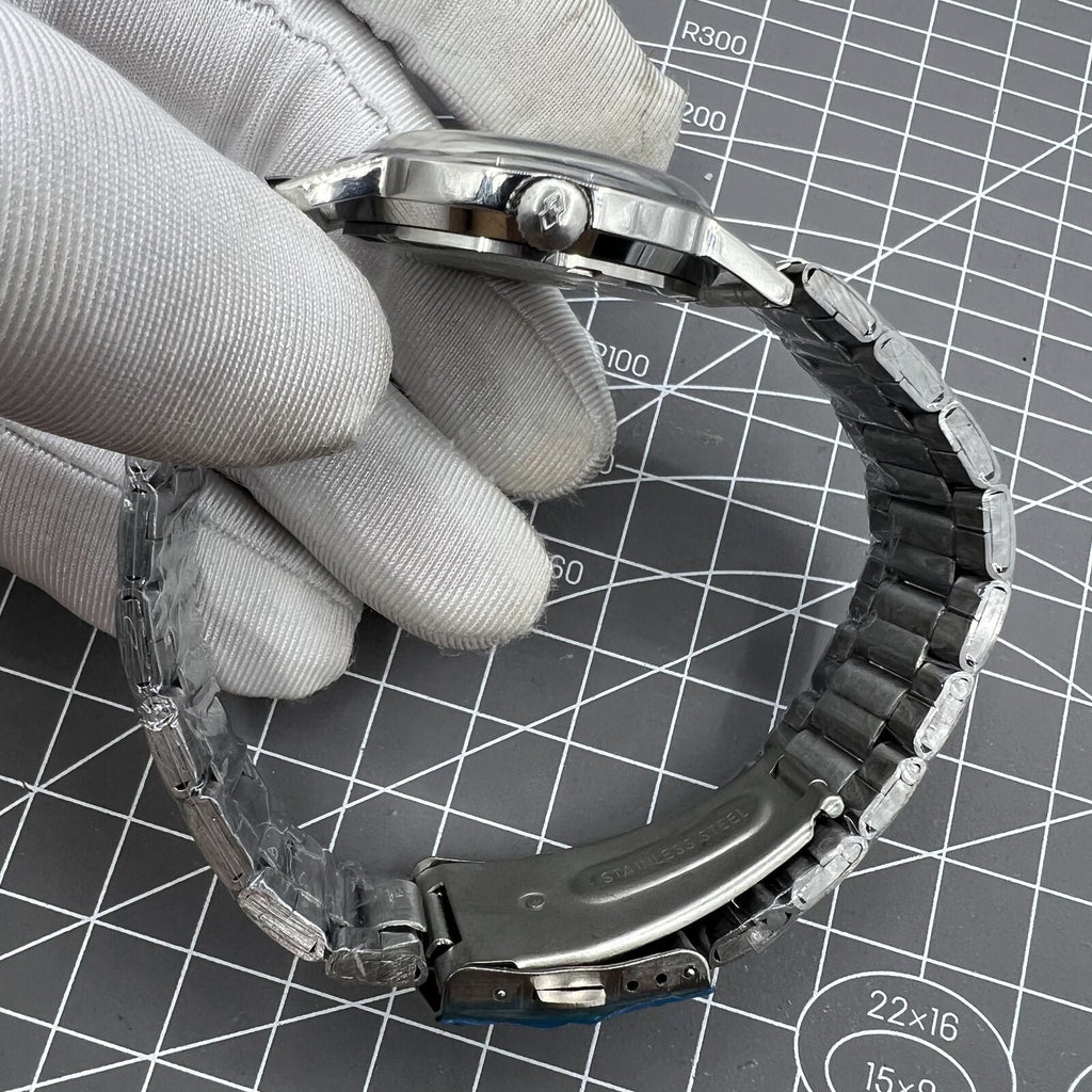 Silver 36mm Beijing Double Rhomb manual mechanical watch with silver case and nail markers, classic design by Beijing brand.