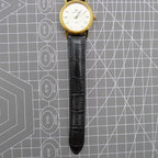 Beijing Double Rhomb mechanical watch with golden case, silver hour markers, and elegant classic style.