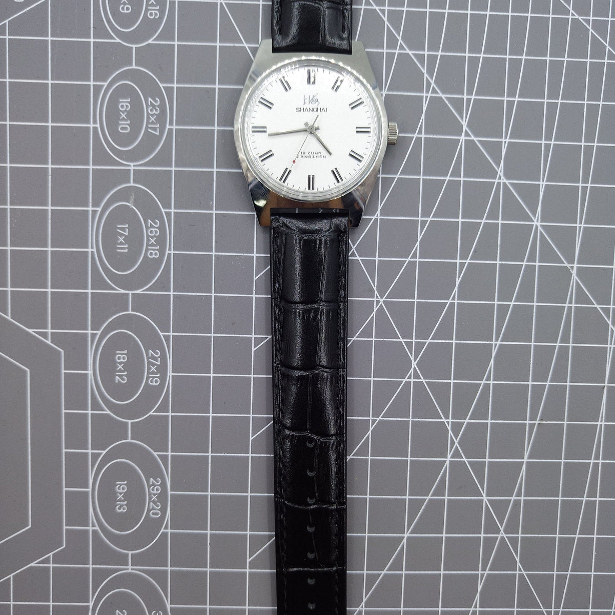 Shanghai Factory 38mm manual mechanical watch with white dial, 3 hands, 19 jewels, classic style for elegant wear.
