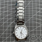 Shanghai Diamond 38mm manual mechanical watch with 17 jewels, white dial, silver case, elegant design.