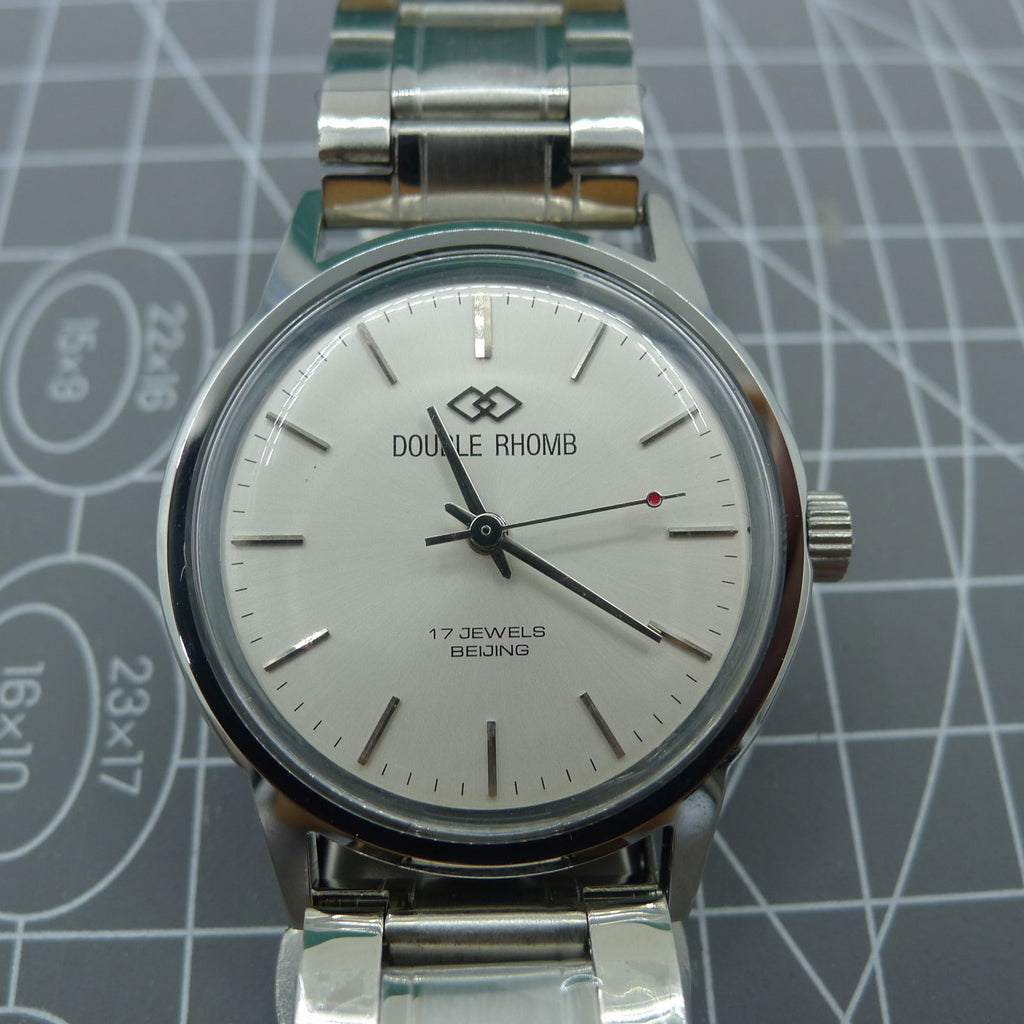 Beijing 36mm manual mechanical watch with silver case, silver nail indices, classic style for enthusiasts and collectors.