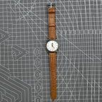 33mm Chunlan steel manual mechanical watch with silver dial and 17-jewel movement, paired with a sleek watch band.