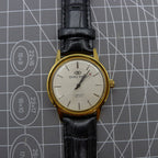 Beijing Double Rhomb mechanical watch with golden case and silver hour markers, elegant classic style.