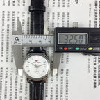 Beijing 31mm manual mechanical watch with silver case and double rhomb dial, classic Chinese craftsmanship.