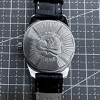 Taihang 32mm manual mechanical watch with black strap, golden markers, and black dial for classic elegance.