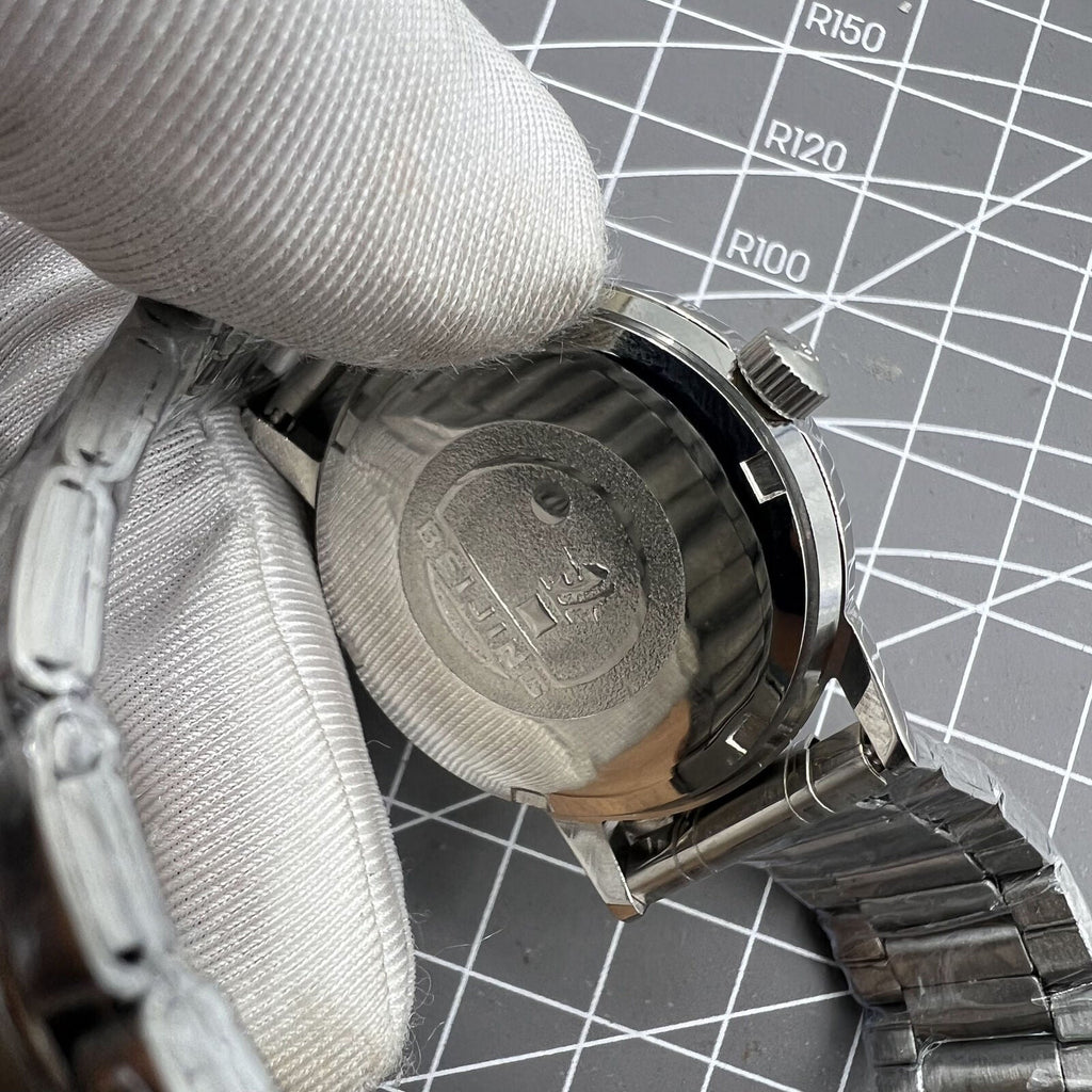 Beijing Silver 36mm Double Rhomb manual watch with silver case and nail markers, classic style accessory.