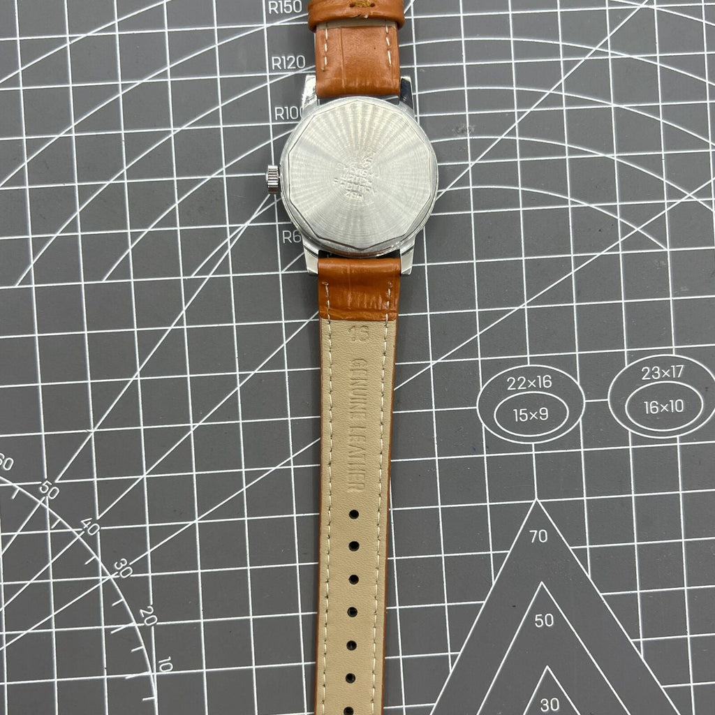 Shanghai Factory 32mm manual mechanical watch with silver case, silver hour markers, and classic design.