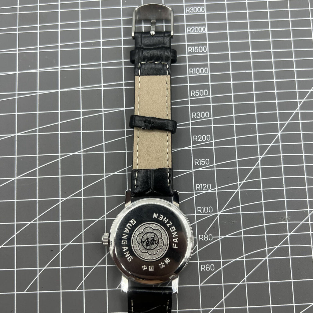 Baihua 37mm manual mechanical watch with silver dial, 19 jewels, shock-resistant for lasting performance.