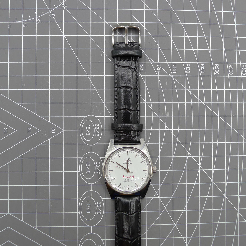 Shanghai Factory 37mm 7120 men's manual mechanical watch in classic style with shock-resistant design and stainless steel case.