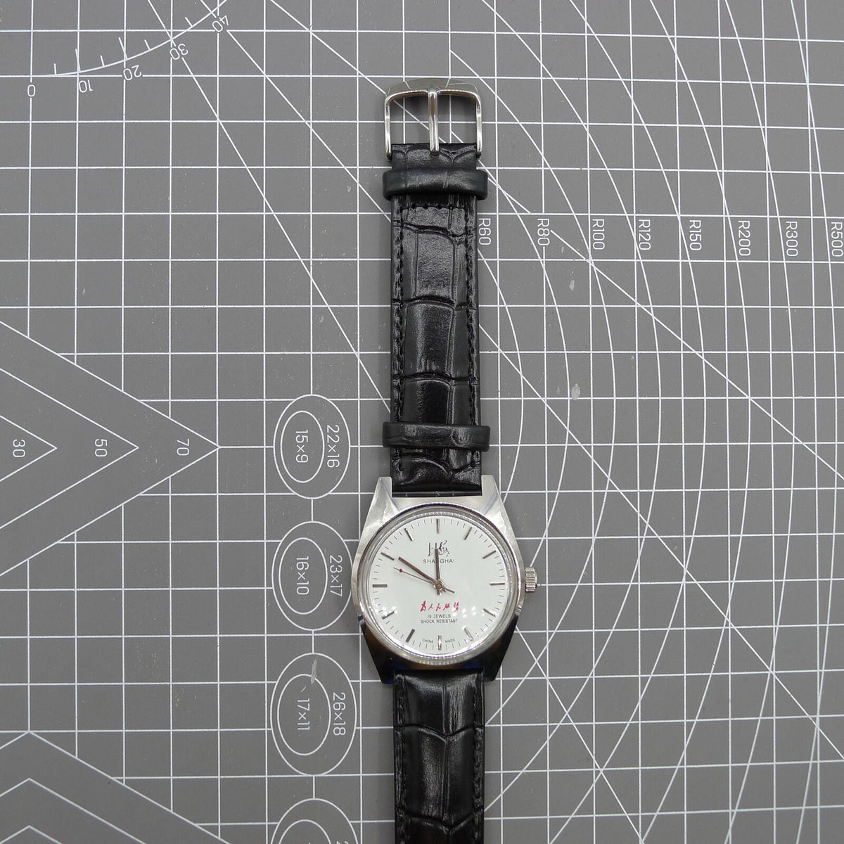 Shanghai Factory 37mm 7120 men's manual mechanical watch in classic style with shock-resistant design and stainless steel case.