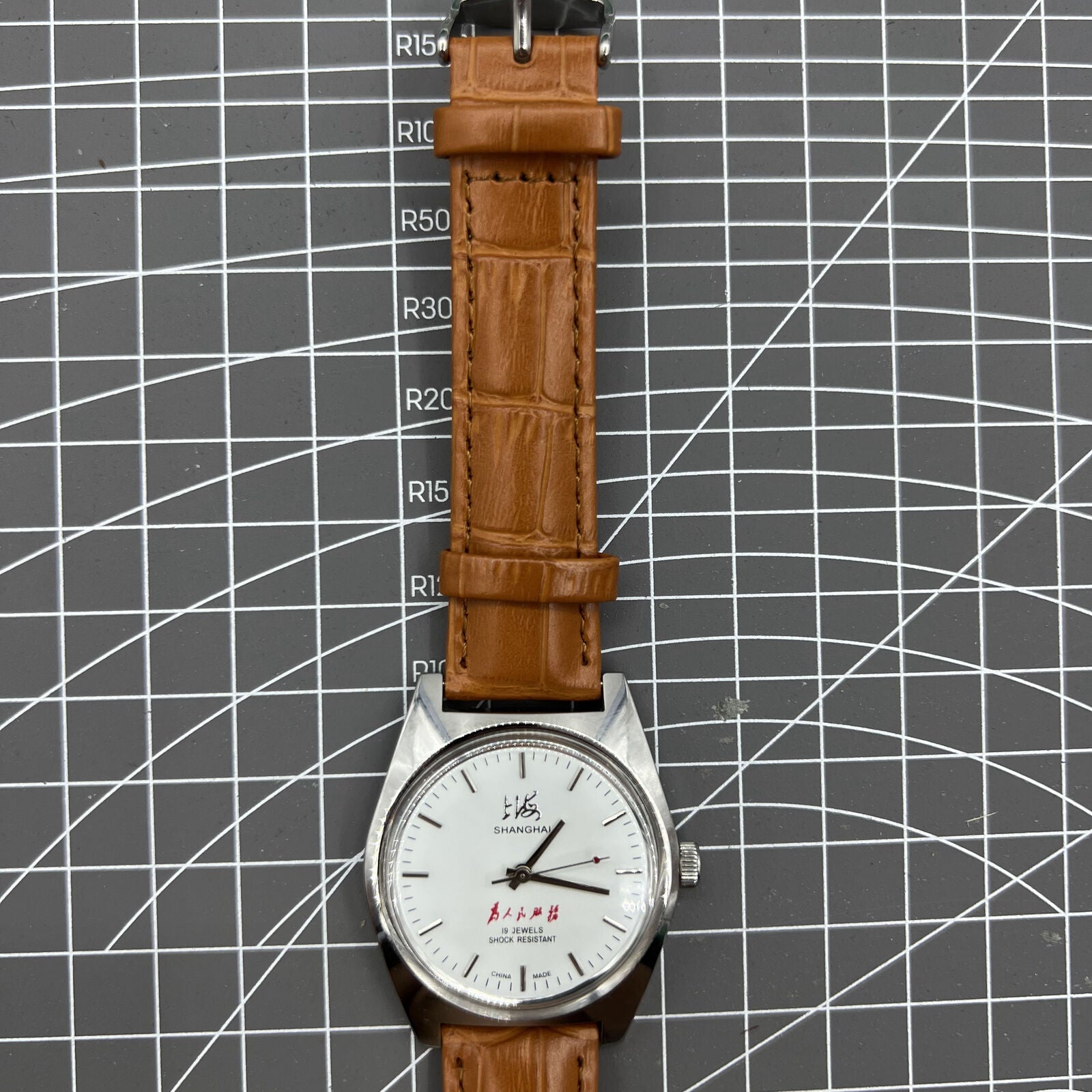Shanghai Factory 7120 men's 37mm manual mechanical watch with shock-resistant movement and classic design.