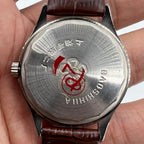 Shanghai 37mm manual watch with golden dial, nail markers, round case, 17 jewel mechanical movement by Shanghai brand.