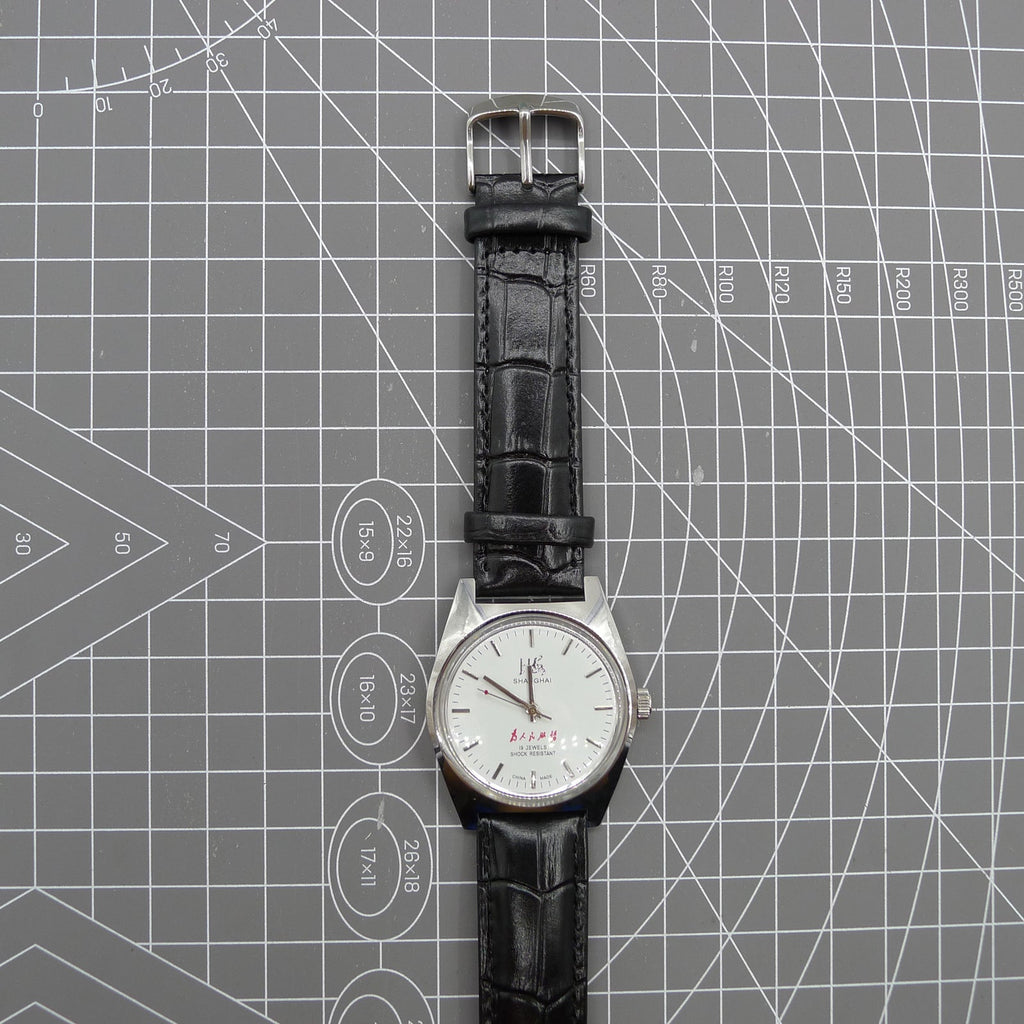 Shanghai Factory 37mm 7120 men's manual mechanical watch showcasing shock-resistant design and classic craftsmanship.