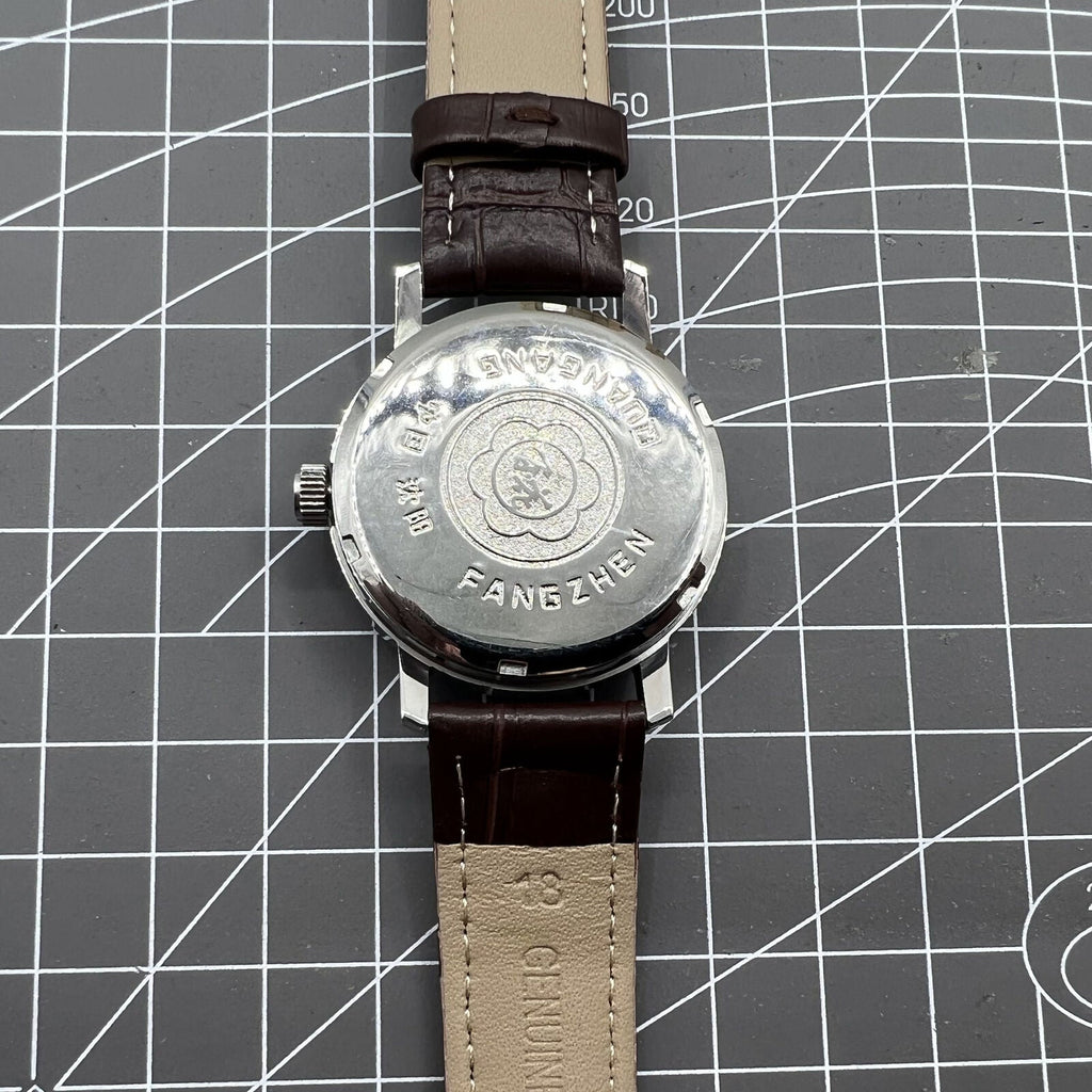 China Baihua 37mm manual mechanical watch with silver dial, 19 jewels, shock-resistant for daily wear.