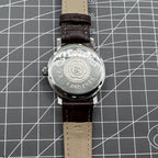 China Baihua 37mm manual mechanical watch with silver dial, 19 jewels, shock-resistant for daily wear.