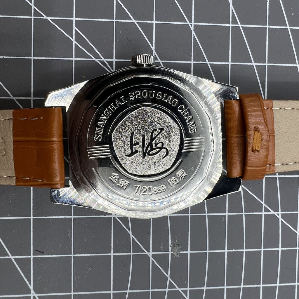 Shanghai Factory 7120 men's 37mm manual mechanical watch featuring shock-resistant movement and classic design for timeless style.
