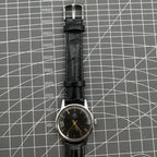 Taihang 32mm manual mechanical watch with black dial, golden nail markers, 17 jewels precision.
