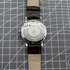 China Baihua 37mm manual mechanical watch with silver dial, 19 jewels, shock-resistant for durable wear.