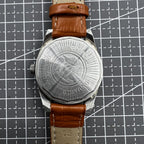 PUBU 32mm manual mechanical watch with grey dial, nail markers, and 17 jewels showcasing precision craftsmanship.