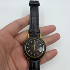 37mm automatic mechanical watch with black dial, golden Roman numerals, and 33 jewels.