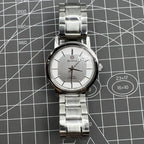 37mm China Baihua manual mechanical watch with silver dial, 19 jewels, shock-resistant design for durability.
