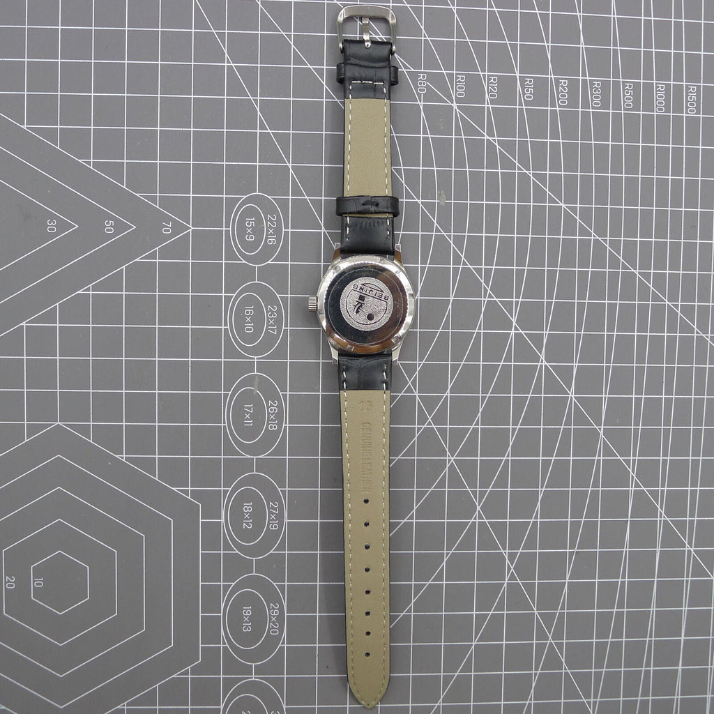 Beijing 31mm Silver Double Rhomb manual watch with three hands, elegant mechanical timepiece design.