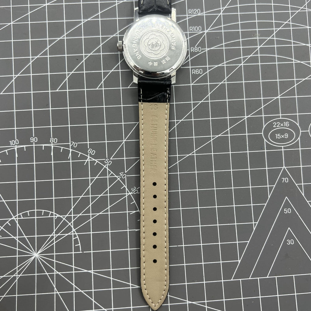 China Baihua 37mm manual mechanical watch with 19 jewels, silver dial, and shock-resistant design for durability.