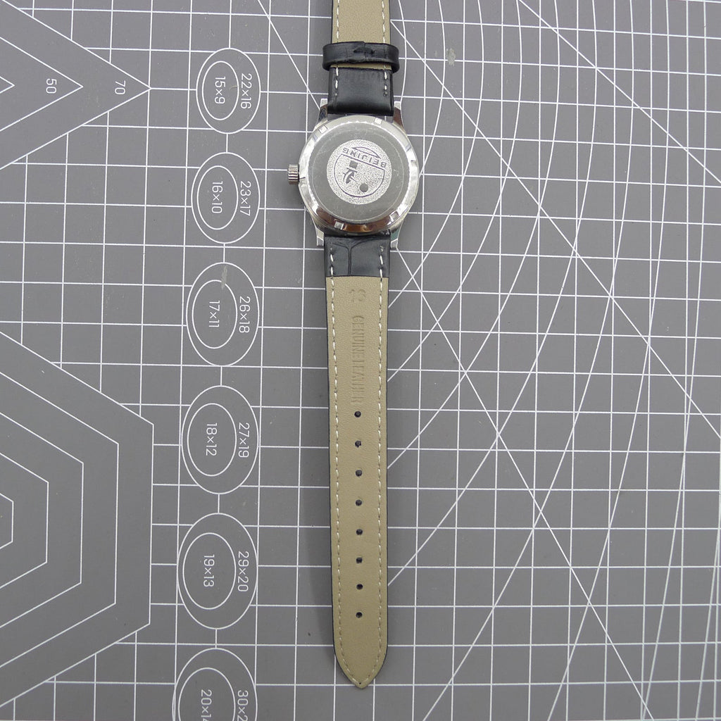 Beijing 31mm manual mechanical watch with silver case, double rhomb dial, showcasing classic Chinese craftsmanship.