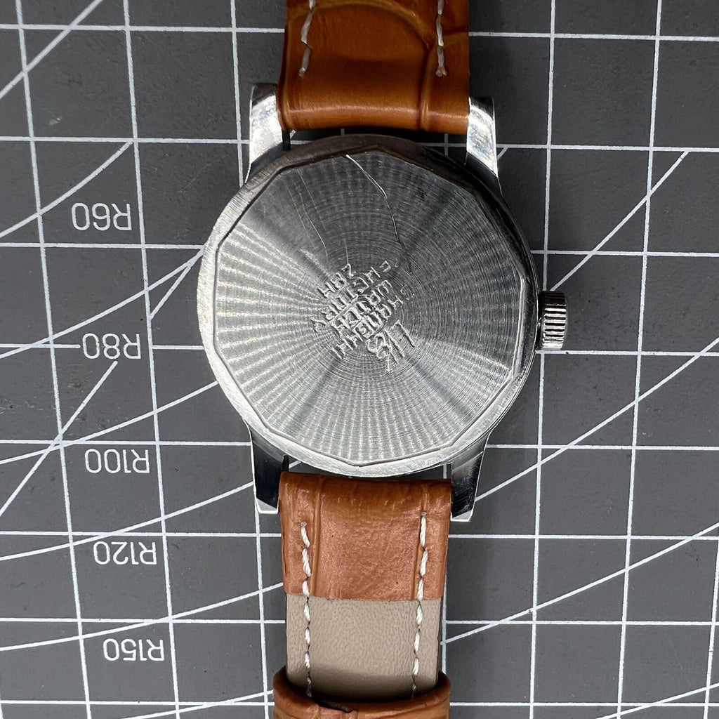 Shanghai Factory 32mm manual mechanical watch with 19 jewels, shock-resistant, classic design, elegant accessory.