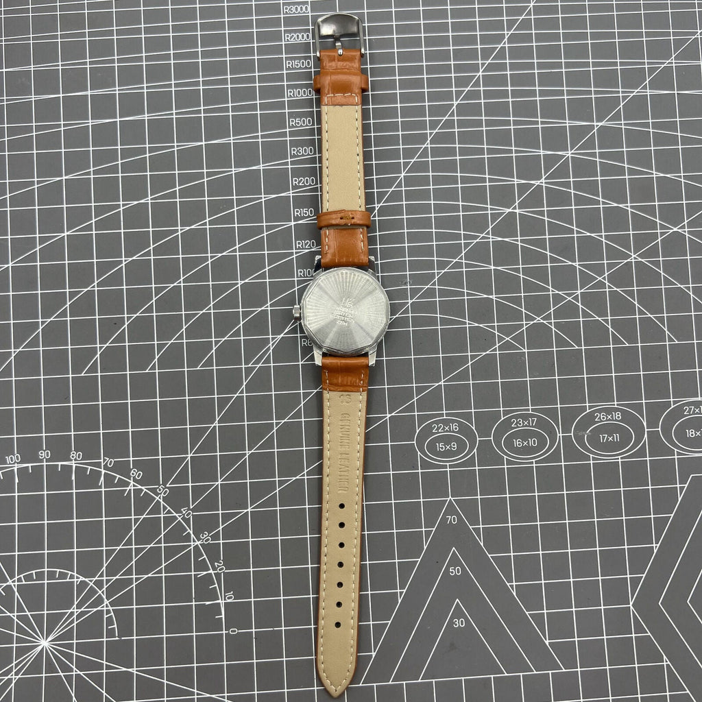 32mm Shanghai Factory manual mechanical watch with silver case and classic silver hour markers.