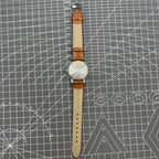 32mm Shanghai Factory manual mechanical watch with silver case and classic silver hour markers.