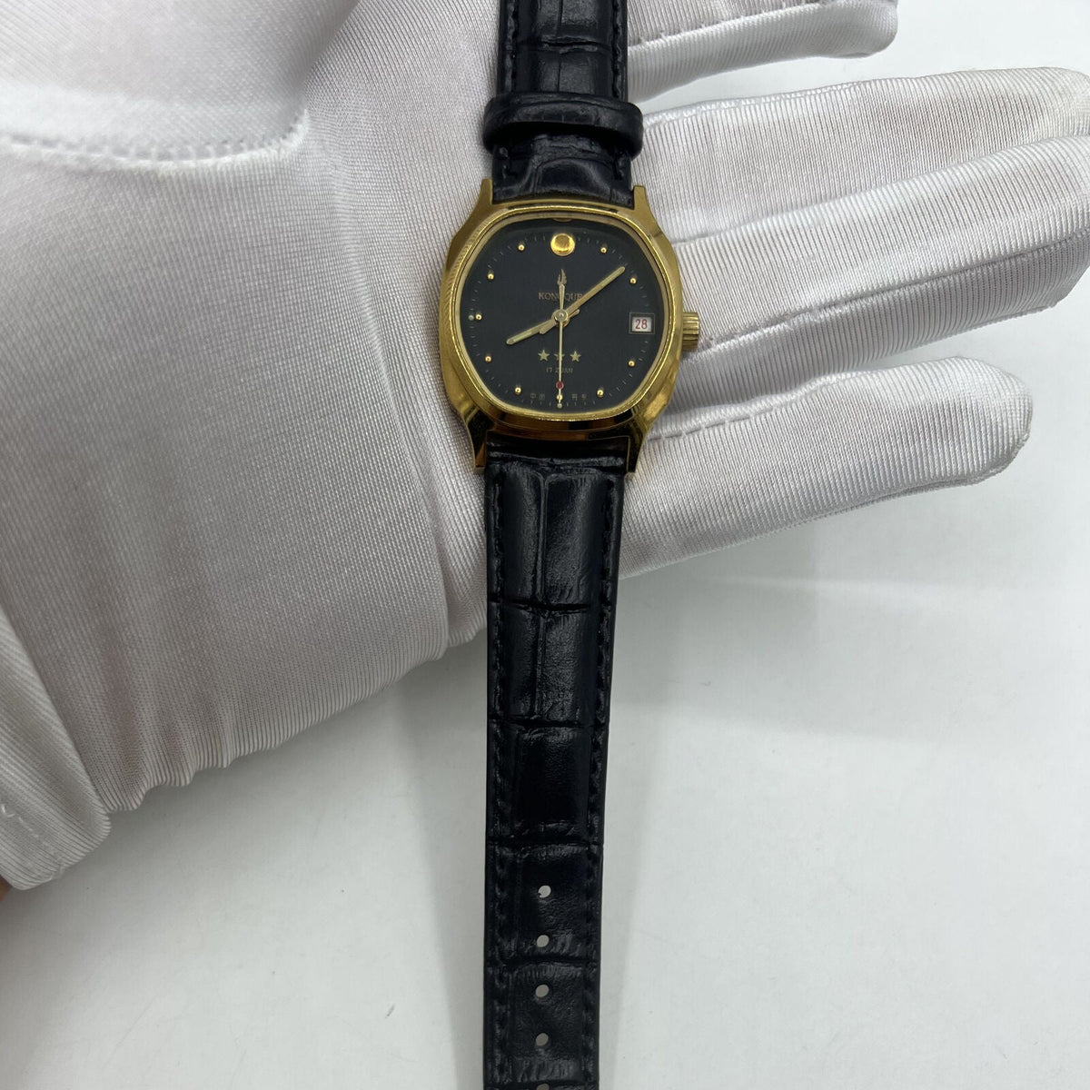 Chunlan 33mm steel manual watch with silver dial, 17 jewels, and matching silver watch band.