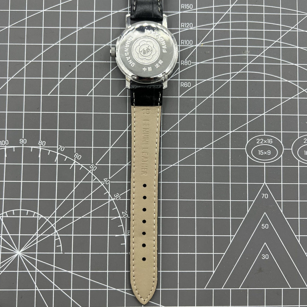 China Baihua 37mm manual mechanical watch with silver dial, 19 jewels, shock-resistant for long-lasting performance.