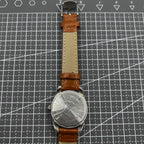 PUBU 32mm manual mechanical watch with grey dial, nail markers, 17 jewels, precision craftsmanship for elegant wear.
