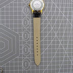 Beijing Double Rhomb mechanical watch in golden case with silver hour markers, elegant style for formal occasions.