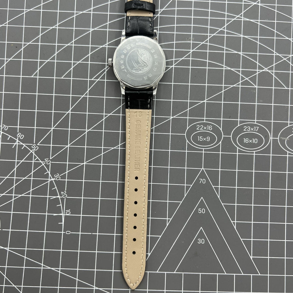 Taihang 32mm manual mechanical watch with black dial, gold markers, 17-jewel movement for precision timekeeping.