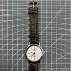 China Baihua 37mm manual mechanical watch with silver dial, 19 jewels, and shock-resistant design.