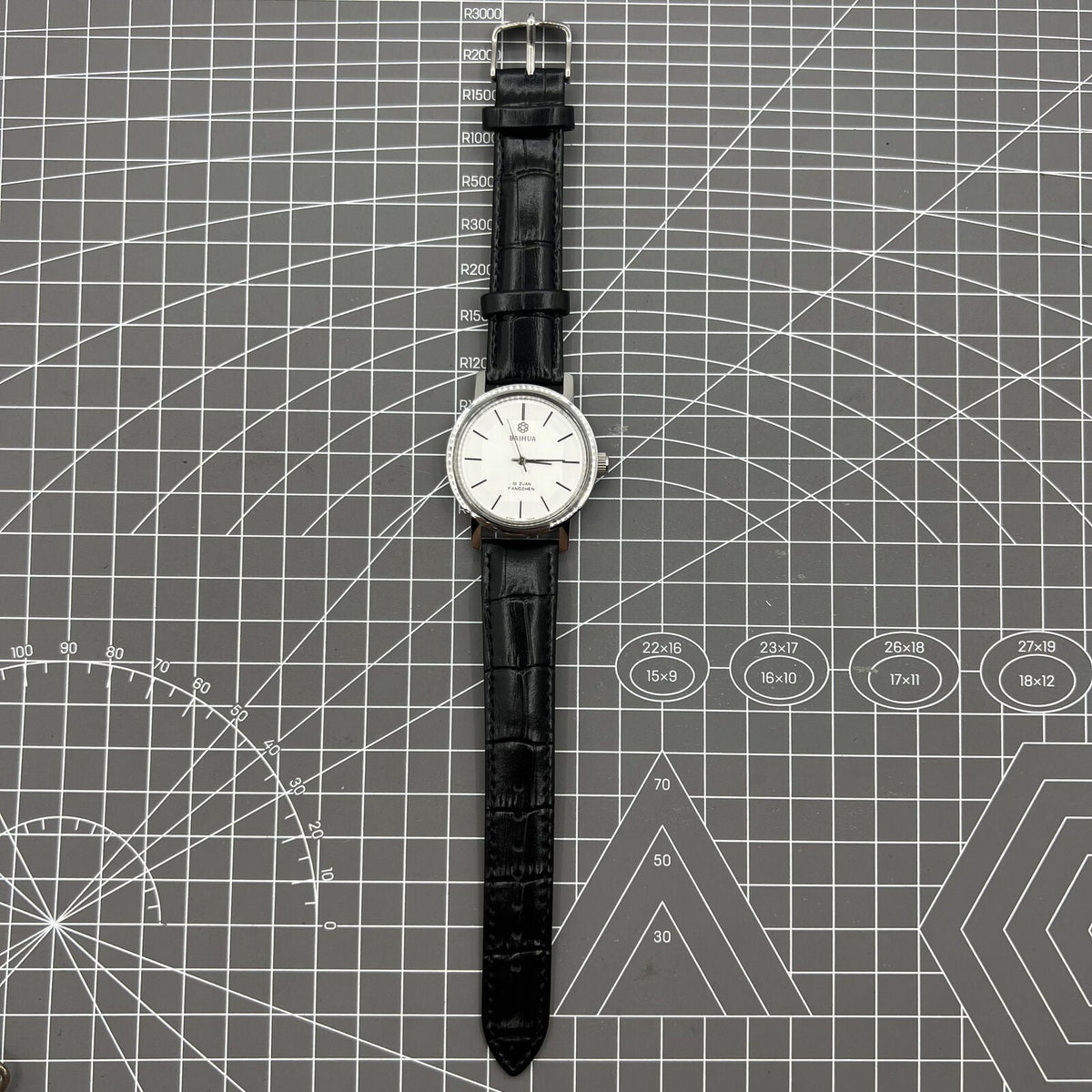 37mm China Baihua manual watch with silver dial, 19 jewels, shock-resistant design for durability