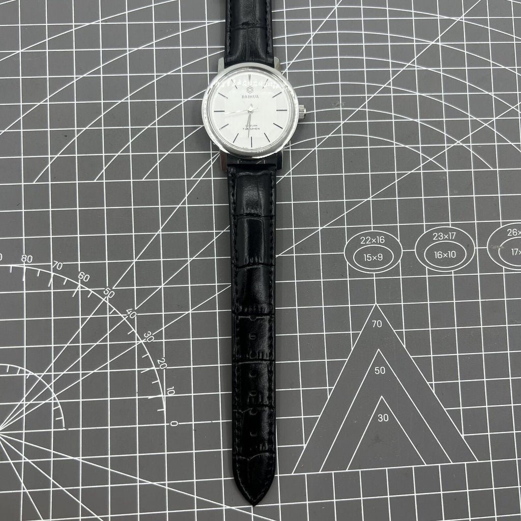 Baihua 37mm manual mechanical watch with silver dial, 19 jewels, shock-resistant for lasting performance.