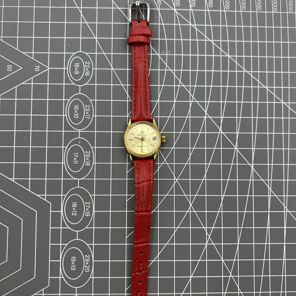 Golden dial Seagull lady watch with 19 jewels, manual mechanical movement, made in Tianjin factory, China.