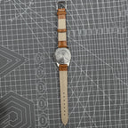 33mm Chunlan manual steel watch with silver dial, 17-jewel movement, and sleek stainless steel band.