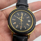 37mm automatic watch with black dial, golden Roman numerals, 33 jewels for elegant style.