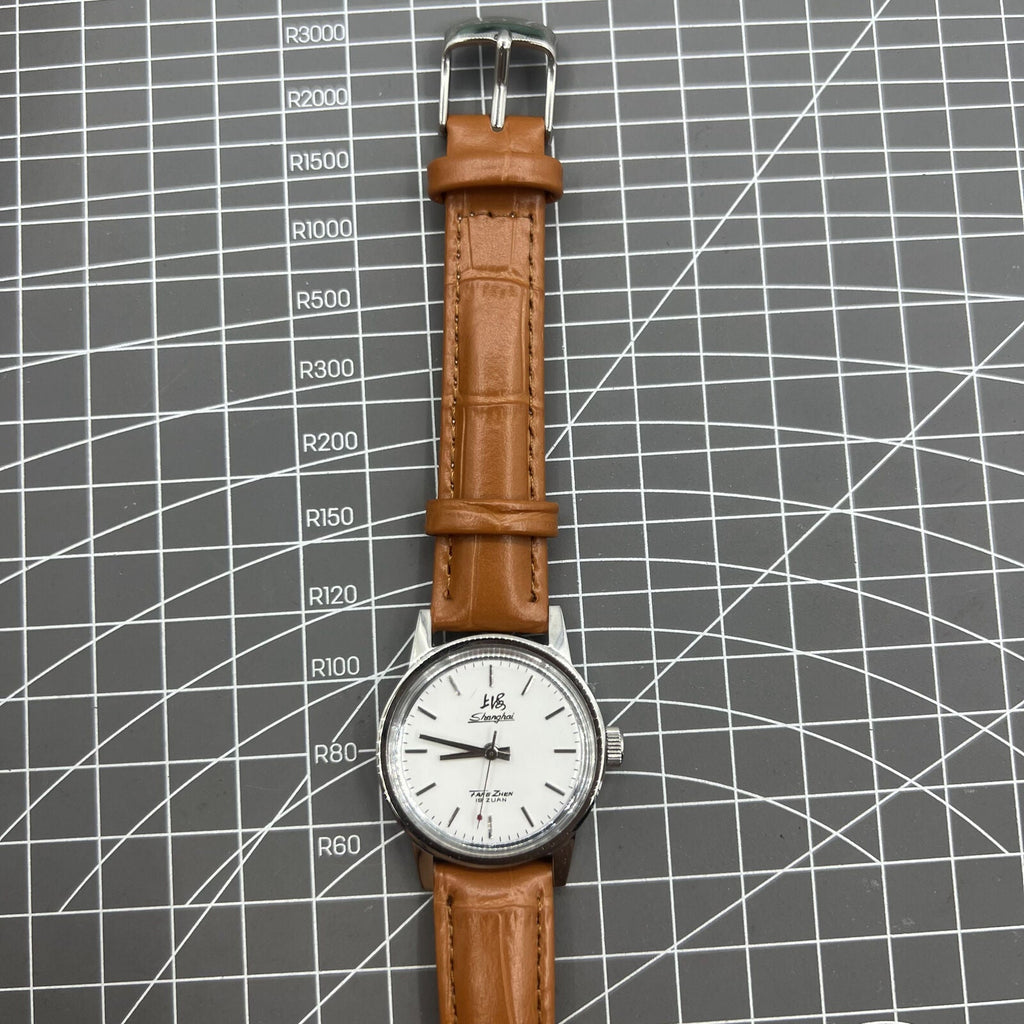 32mm Shanghai Factory manual mechanical watch with silver case and silver hour markers, classic design
