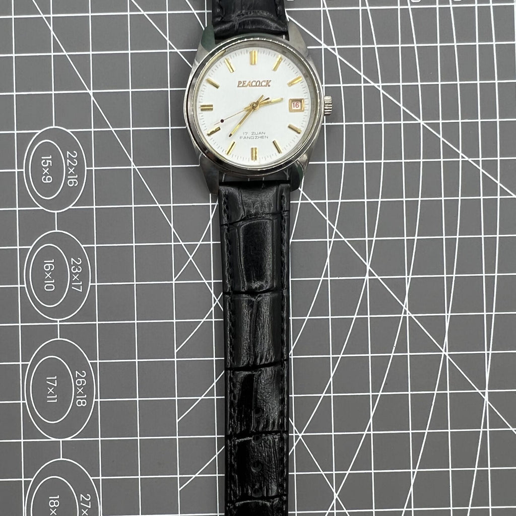 Liaoning Factory Made Peacock mechanical watch showcasing 17 jewels with shock-resistant durable design.