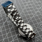 33mm Shanghai manual mechanical watch with single calendar, 17 jewels, shock-resistant design for classic timekeeping.