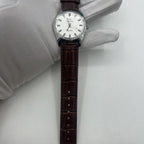 Shanghai Factory 38mm manual watch with white dial, 3 hands, 19 jewels for accurate timekeeping.