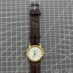 Beijing Double Rhomb mechanical watch with golden case and silver nail markers, elegant design