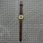 Brown 26mm Liaocheng TAISHAN manual mechanical lady watch with 19 jewels and golden nail details